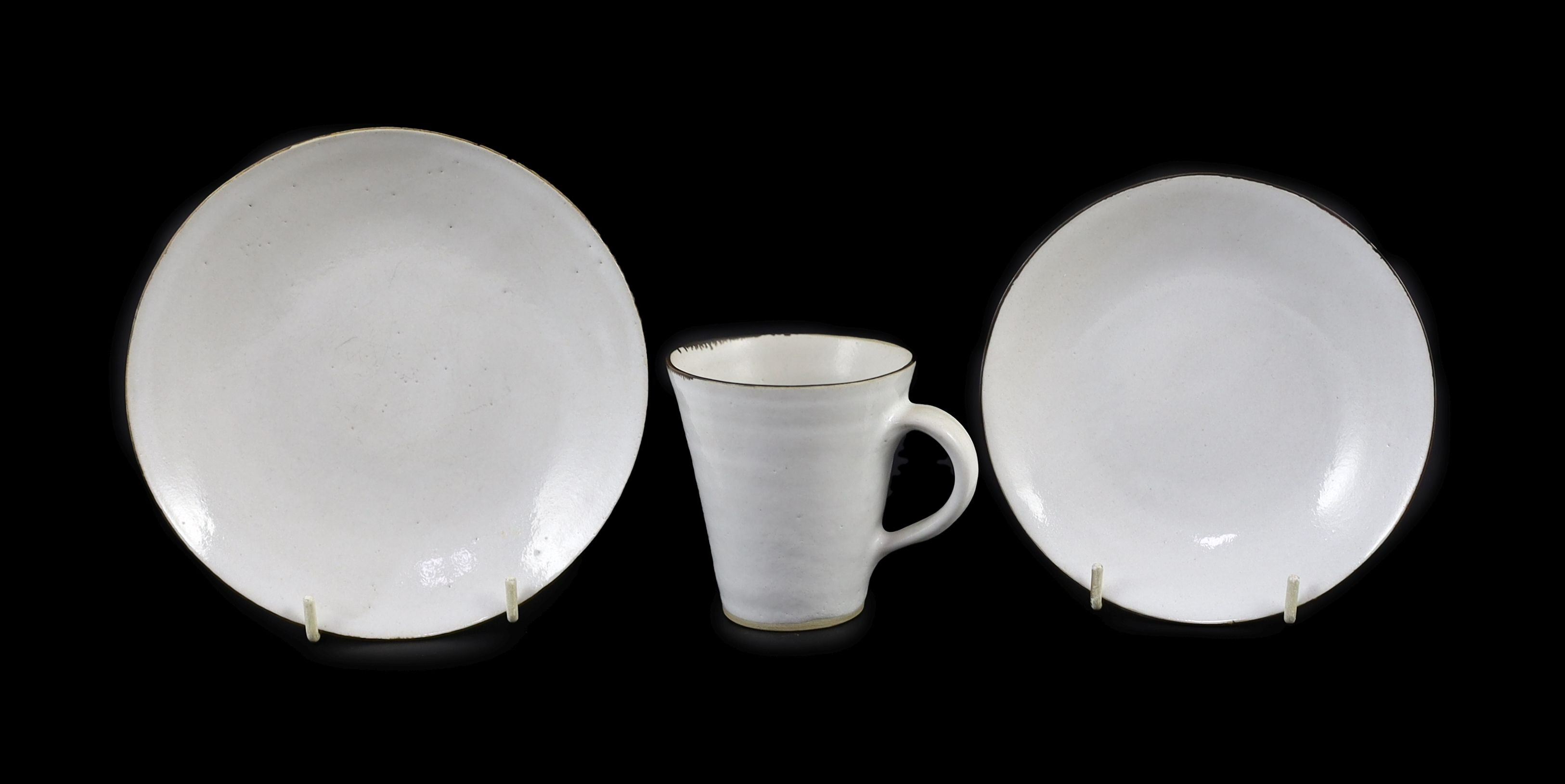 Dame Lucie Rie (1902-1995) a cup, saucer and side plate, c.1959, Cup 8.1 cm high